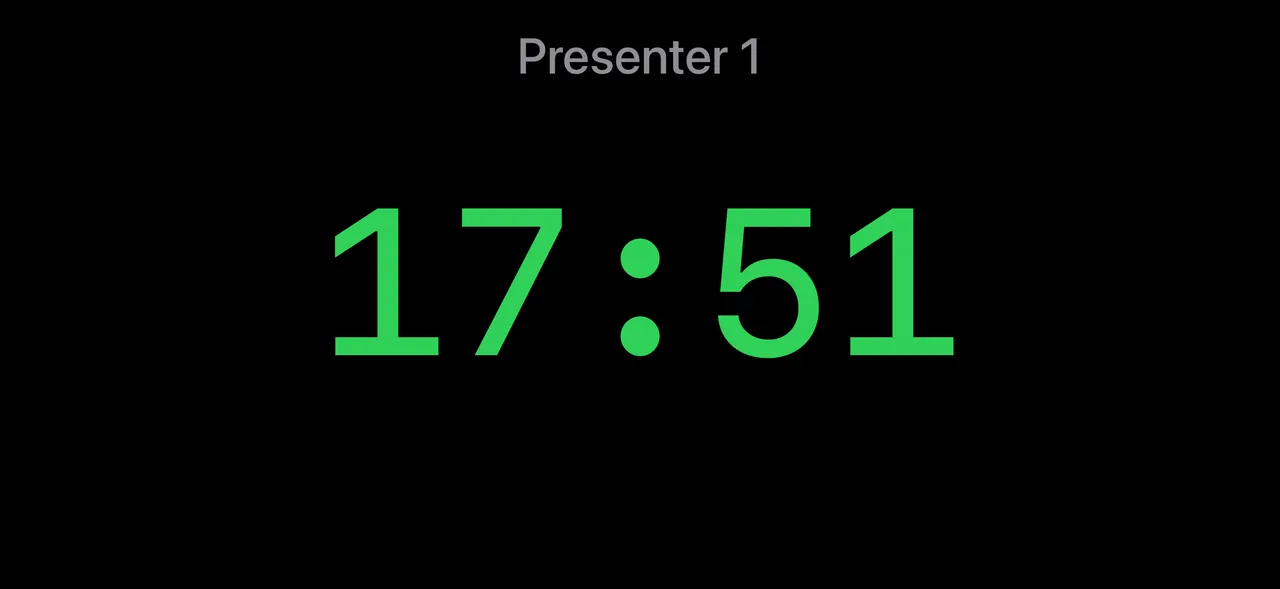 A full-screen Event Timers countdown on an external display
